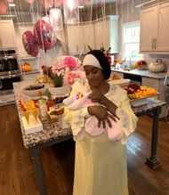 Ti Taylor, shares an image of herself holding her new born baby (Image via Instagram/@titaylor)